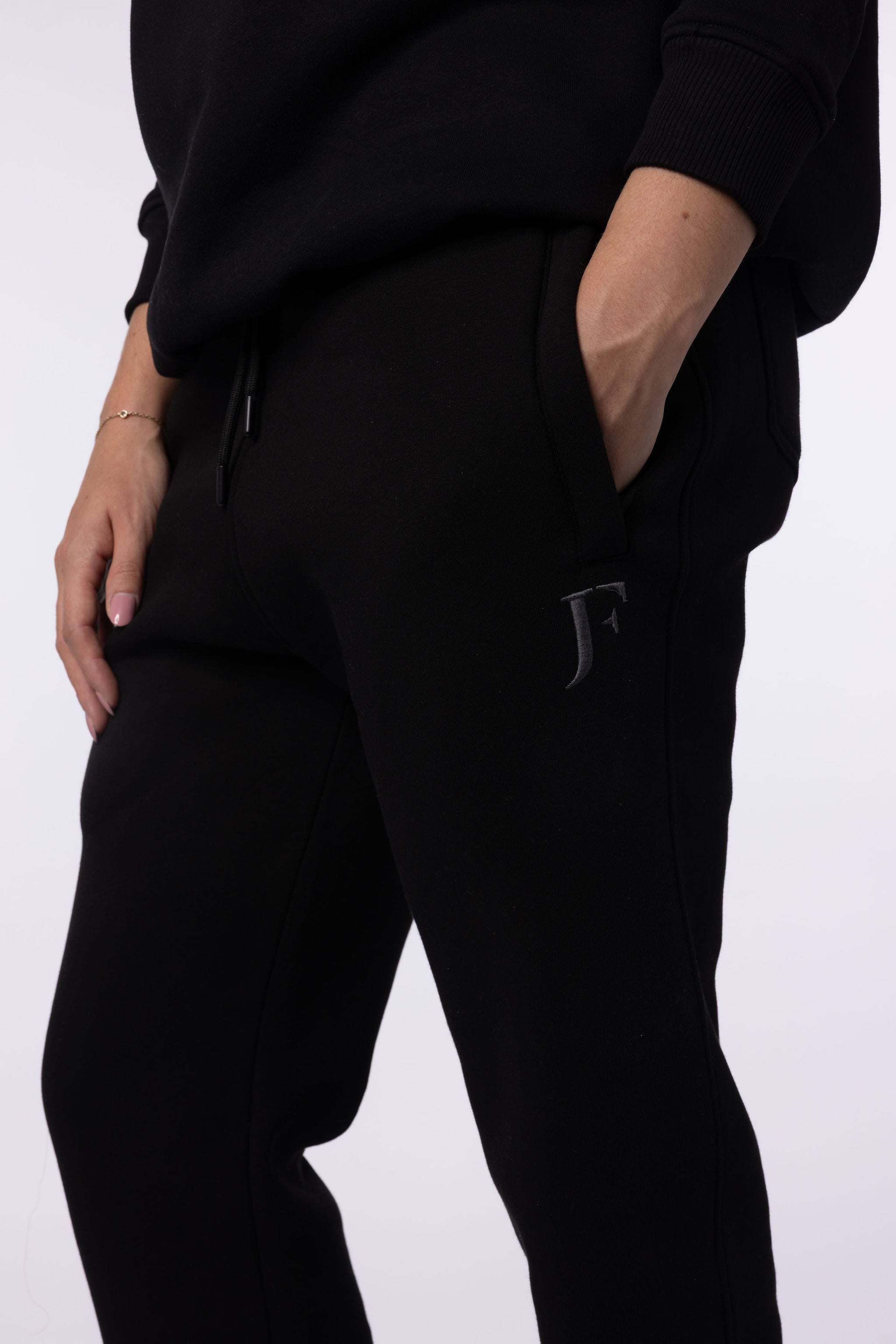 JF - Evolutie Tracksuit Zwart Unisex