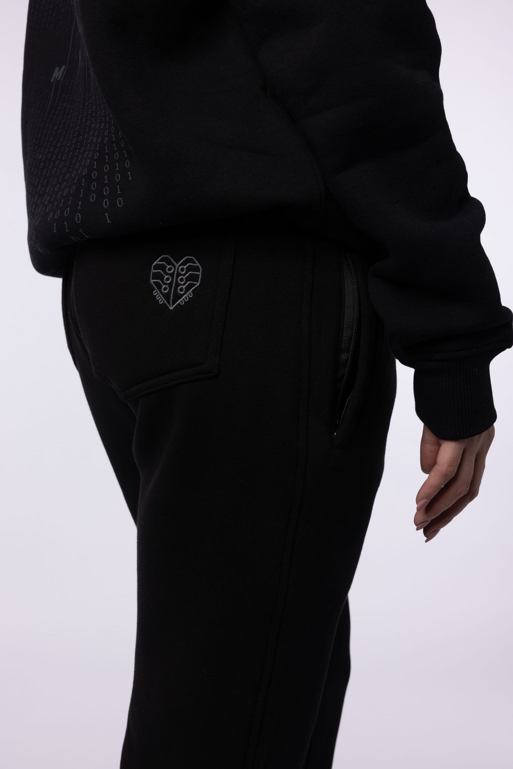 JF - Evolutie Tracksuit Zwart Unisex