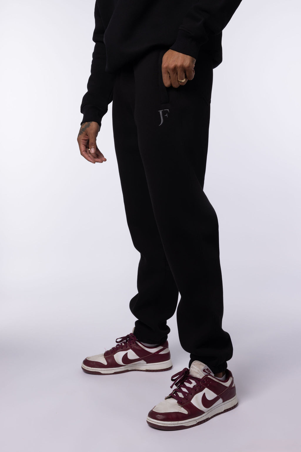 JF - Evolutie Tracksuit Zwart Unisex
